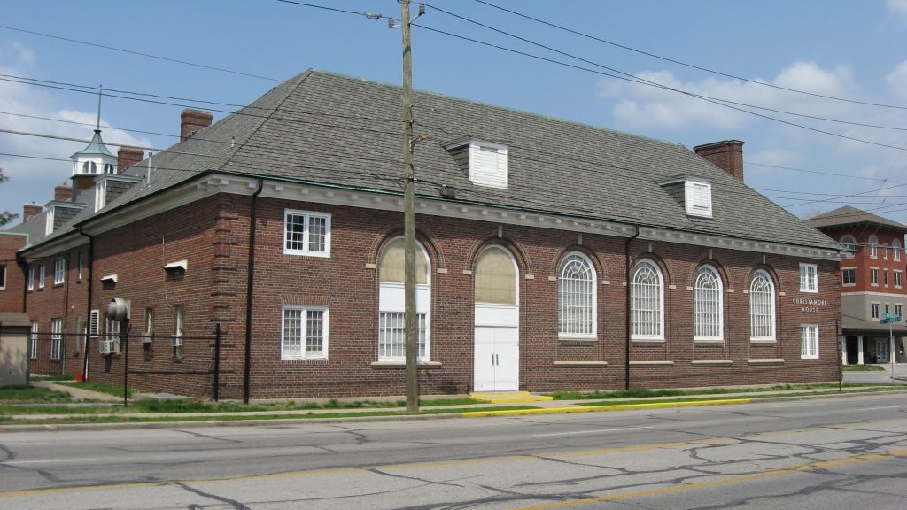 A two-story brick building. 