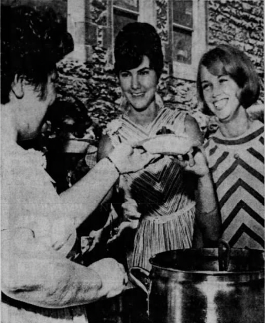 Two women serve a dessert at the Christ Church Cathedral Strawberry Festival