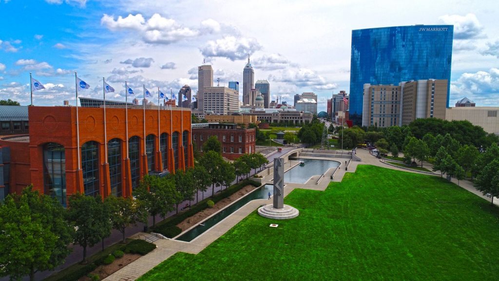 The NCAA Hall of Champions and Celebration Plaza are shown. A green space includes an open area of walkways, lawns and the famous Indy sculpture entitled “Totem.”