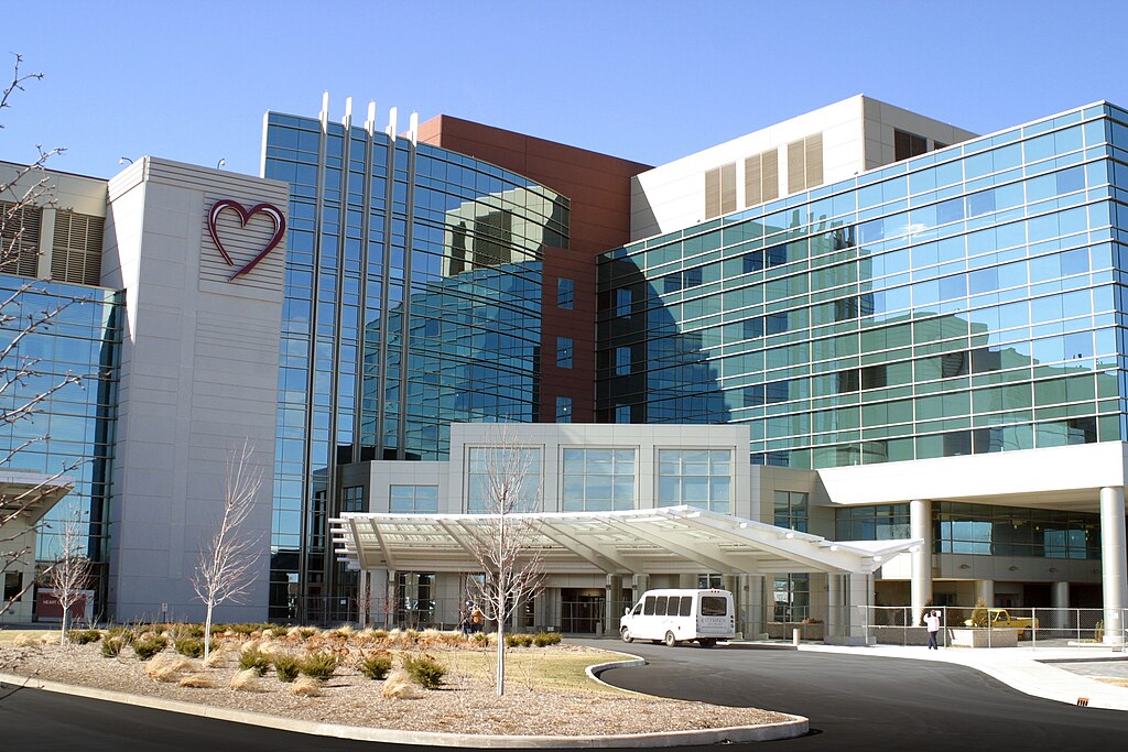 Front entrance to a large hospital building. 