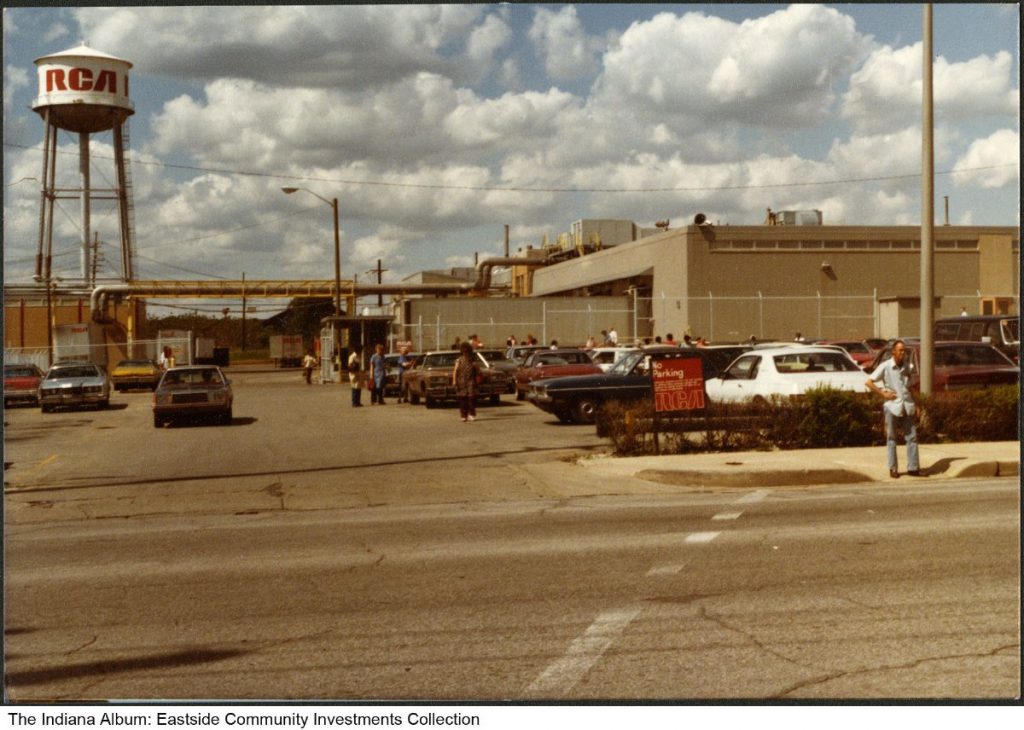 Workers stand in the parking lot of the RCA Manufacturing Plant.