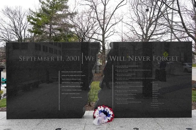 A pair of six-foot tall black granite walls inscribed with remembrances of the events in New York City; Washington, D.C.; and Shanksville, Pennsylvania.