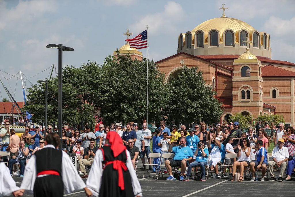 Festival-goers watch a live performance at the annual Greek Fest at Holy Trinity Greek Orthodox Church.