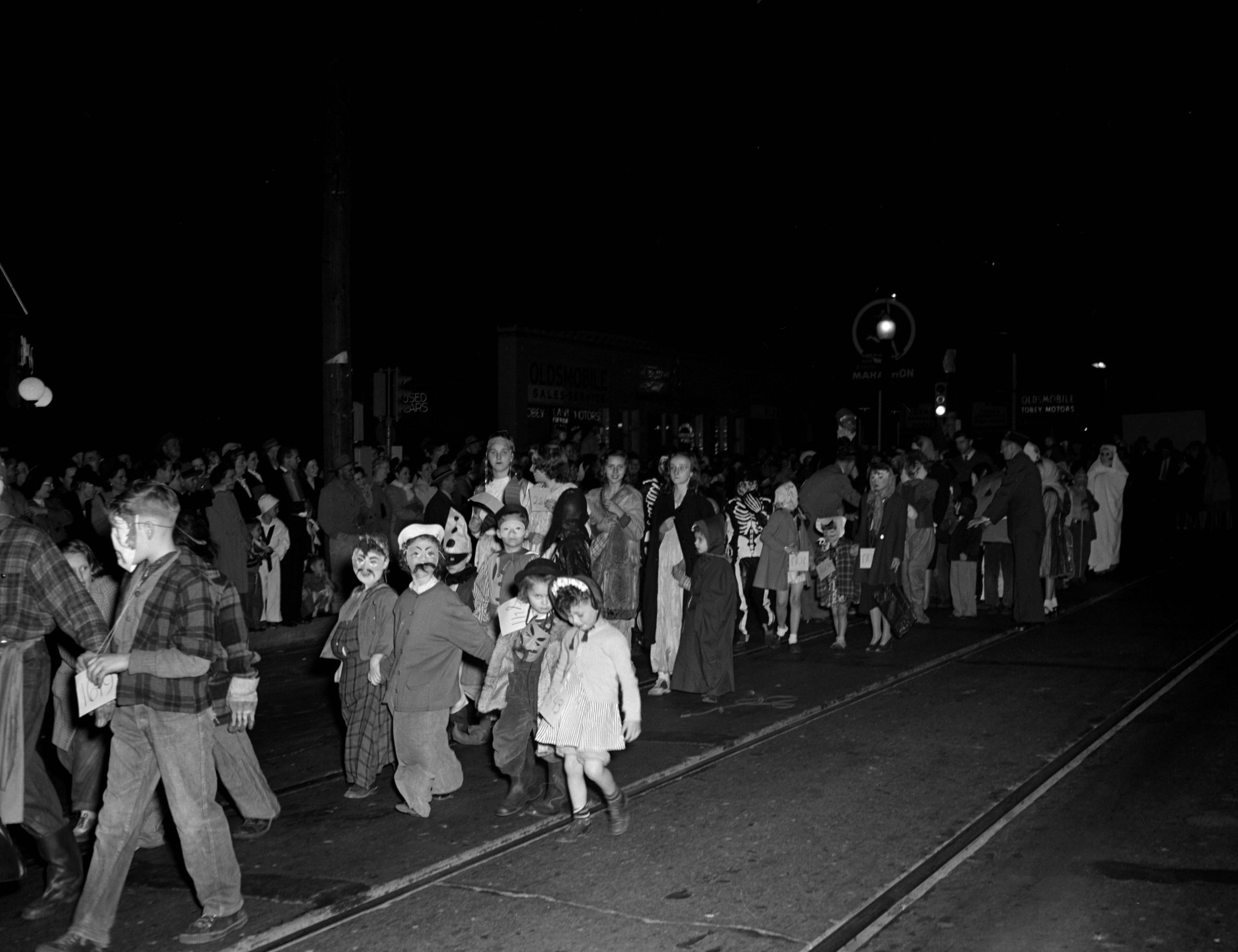 Costumed children walk in the Irvington Halloween Festival parade in 1947.