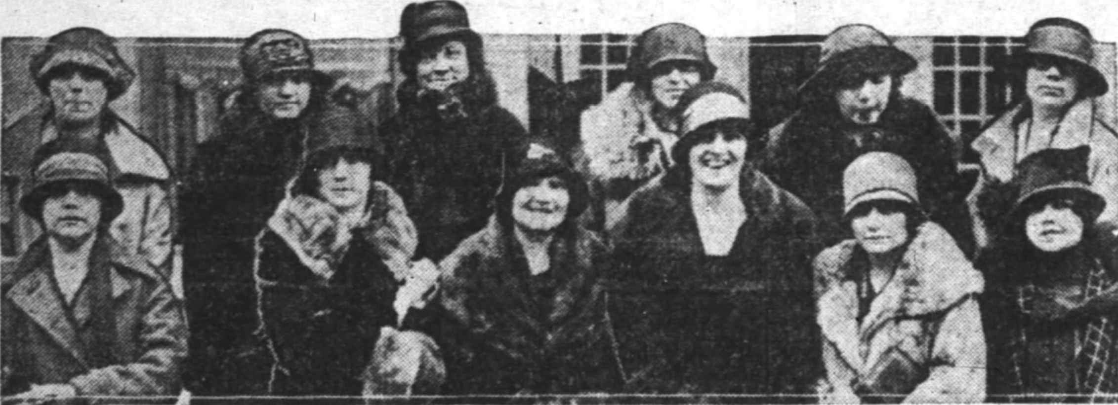 A group of women in two rows.