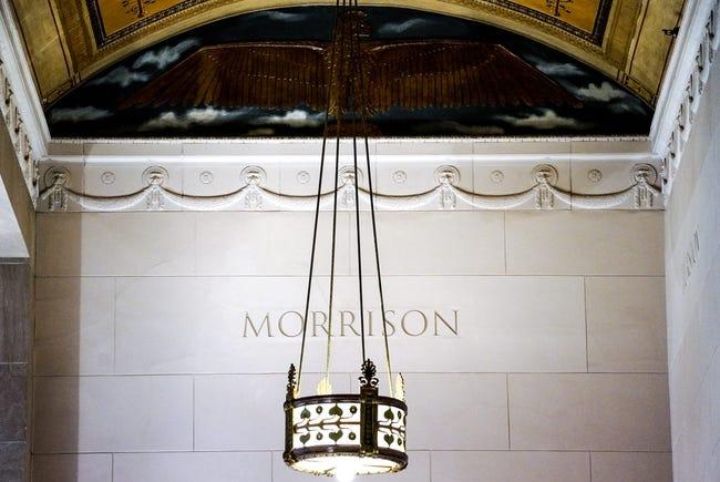 Close up view of the top of a wall. The name Morrison is engraved in a tile on the wall.