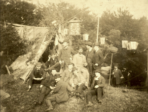William Forsyth is pictured (seated on the ground, second from right) as a young man with other artist friends, possibly the Bohe Club, sometime around 1885. 