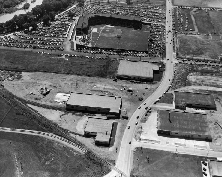 Aerial view of Bush Stadium, 1960s - the stadium's large parking lot is filled with cars.