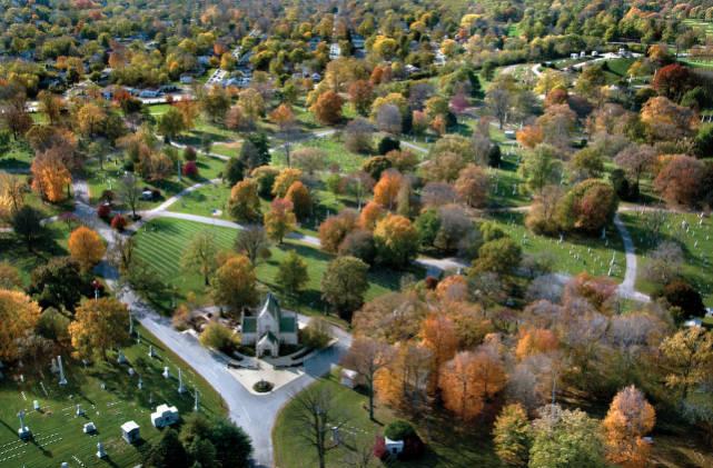 Aerial View of Crown Hill Cemetery showing trees in the midst of changing color for Fall.