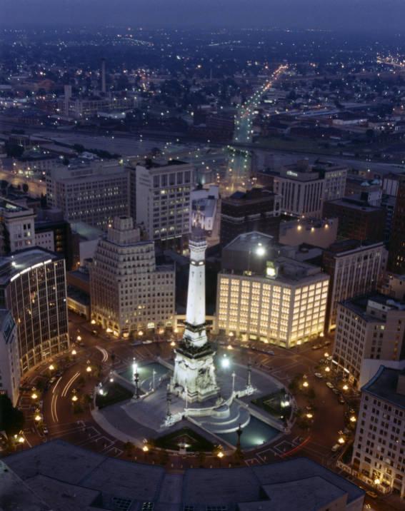 Aerial view of Monument Circle and the Soldiers & Sailors monument at night, 1983