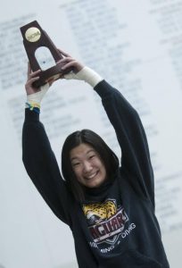 Chen Ni holding her NCAA champion trophy, 2010