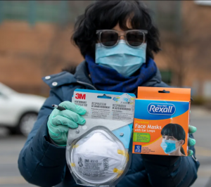 A member of the Chinese community works at a mask donation effort in Carmel, 2020