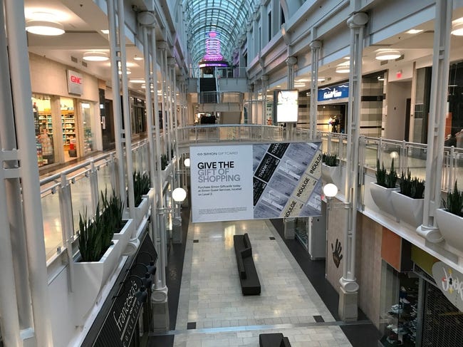 Interior view of a two-story wing of the mall.