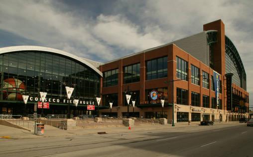 Exterior view of the entrance to the fieldhouse. The glass front entry has an arched roof.