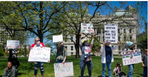 Hoosiers gather at the south lawn of the Indiana State Capitol building during a back to work protest, 2020