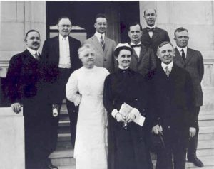 Indiana University officials and hospital staff pose at the front door of Long Hospital for its dedication, 1914