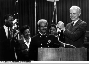 Indianapolis Fire Chief Joseph D. Kimbrew is sworn in by Mayor William H. Hudnut, III, 1987