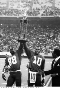 Members of the Mississippi Valley State University team raise the Circle City Classic trophy, 1984