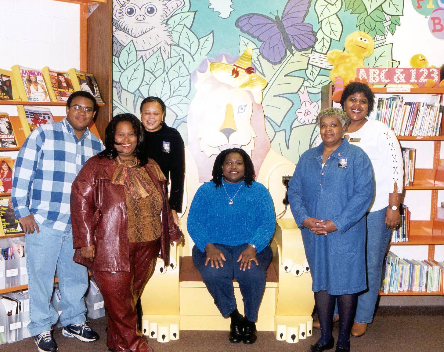 A group of people pose together.