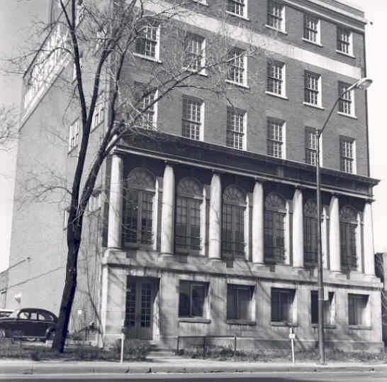 Exterior view of the front of a multistory commercial building.