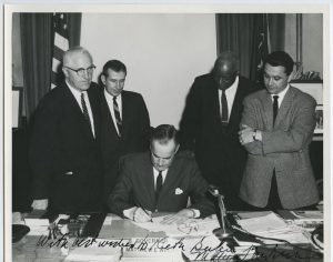 Governor Matthew E. Welsh signs Civil Rights Bill, 1963
