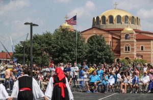 Festival-goers watch a live performance at the annual Greek Fest at Holy Trinity Greek Orthodox Church, 2018