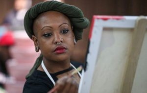 Deonna Craig, shown here in 2018, was one of the artists who painted the Black Lives Matter mural on Indiana Avenue.