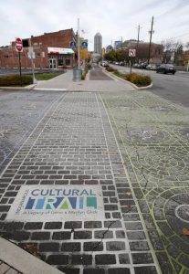 The Cultural Trail runs alongside business and residential complexes on Virginia Avenue in Indy's Fletcher Place and Holy Rosary neighborhoods, 2020