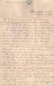 Handwritten document that transfers stock in the Indianapolis Library Association to the Commissioners of Public Schools in Indianapolis, 1872