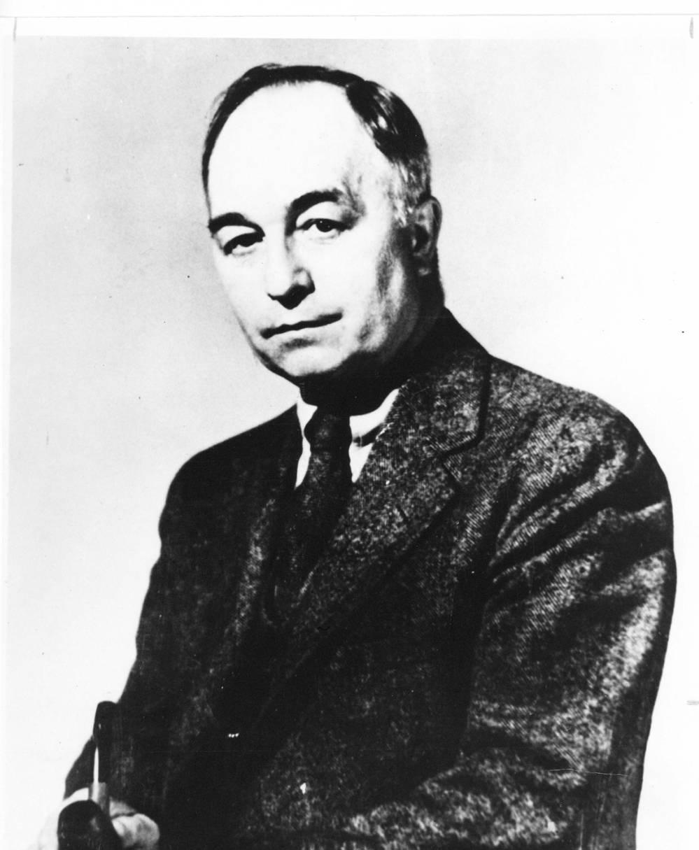 Headshot of Charles E. Rush.