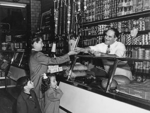 Max Shapiro with customer Frania Kaplan, May 1950