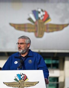 Indiana Gov. Eric Holcomb speaks to reporters after receiving the COVID-19 vaccine at the Indianapolis Motor Speedway, 2021 
