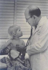 Dr. Morris Green and patient, 1970s 