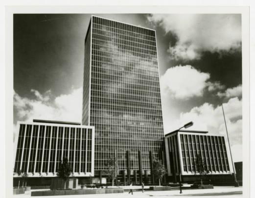 A tall, featureless, black glass rectangular tower.