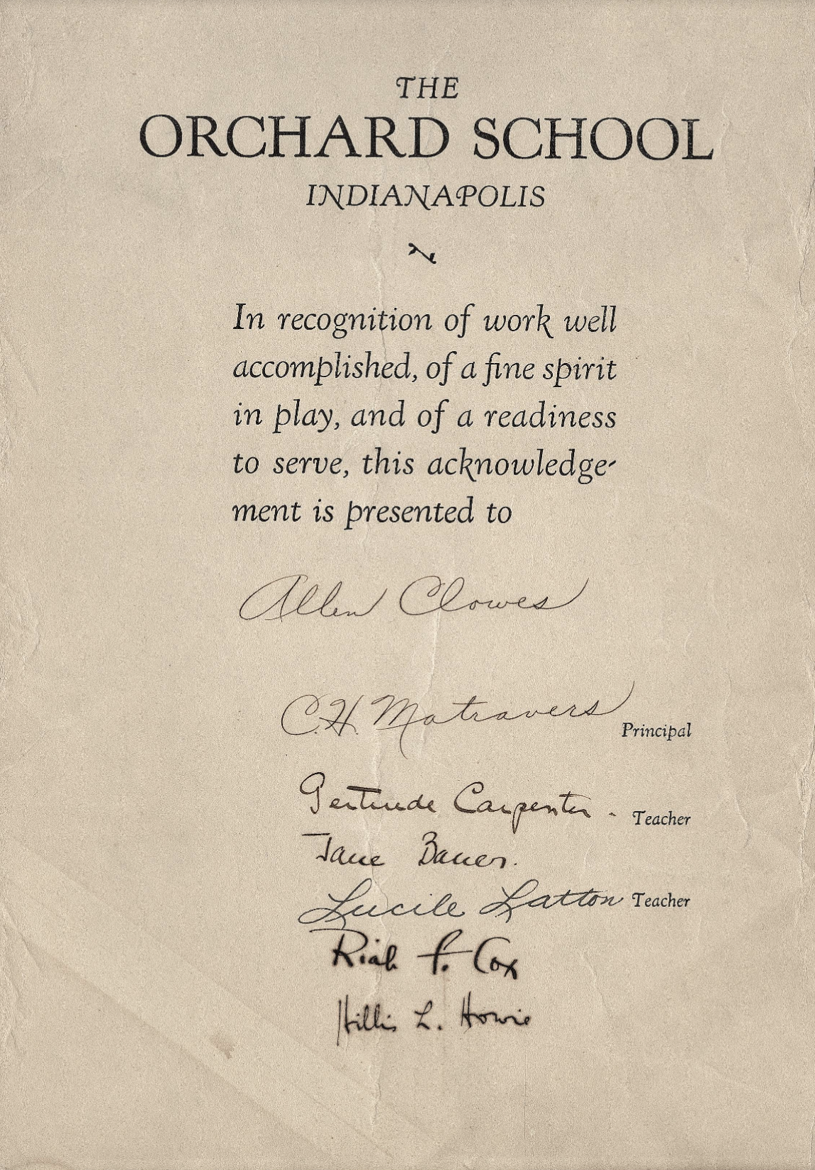 A document that reads "In recognition of work well accomplished, of a fine spirit in play, and of a readiness to serve, this acknowledgement is presented to" with a series of signatures below it. 