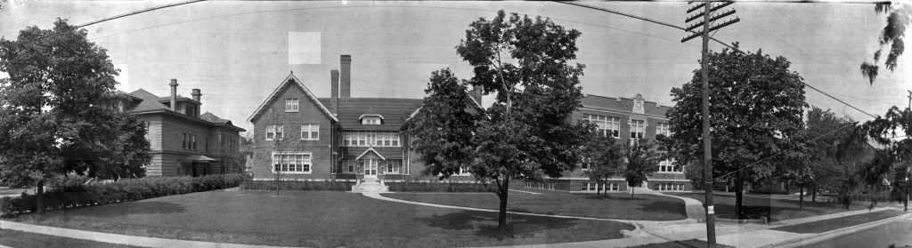 A panoramic view of a brick building.