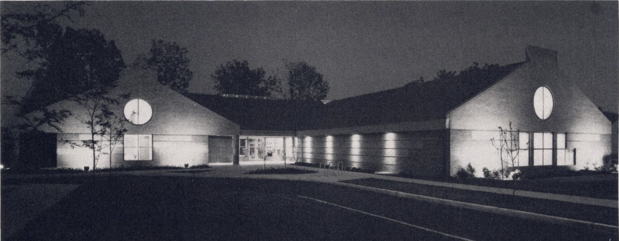 Exterior view of a building at night.