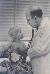 Dr. Morris Green and patient, 1970s 