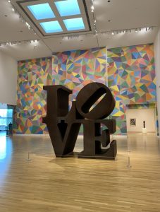 The original LOVE statue by Robert Indiana as displayed in the main foyer of the Indianapolis Museum of Art at Newfields in 2019.