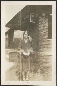 Librarian standing outside South Grove Branch Library, 1923