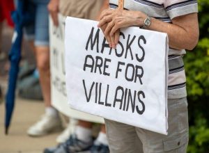 Protesters rallied at the Indiana Statehouse, citing Indiana and federal constitutions as reasons for their dismissal of government mask mandates during the coronavirus pandemic, 2020