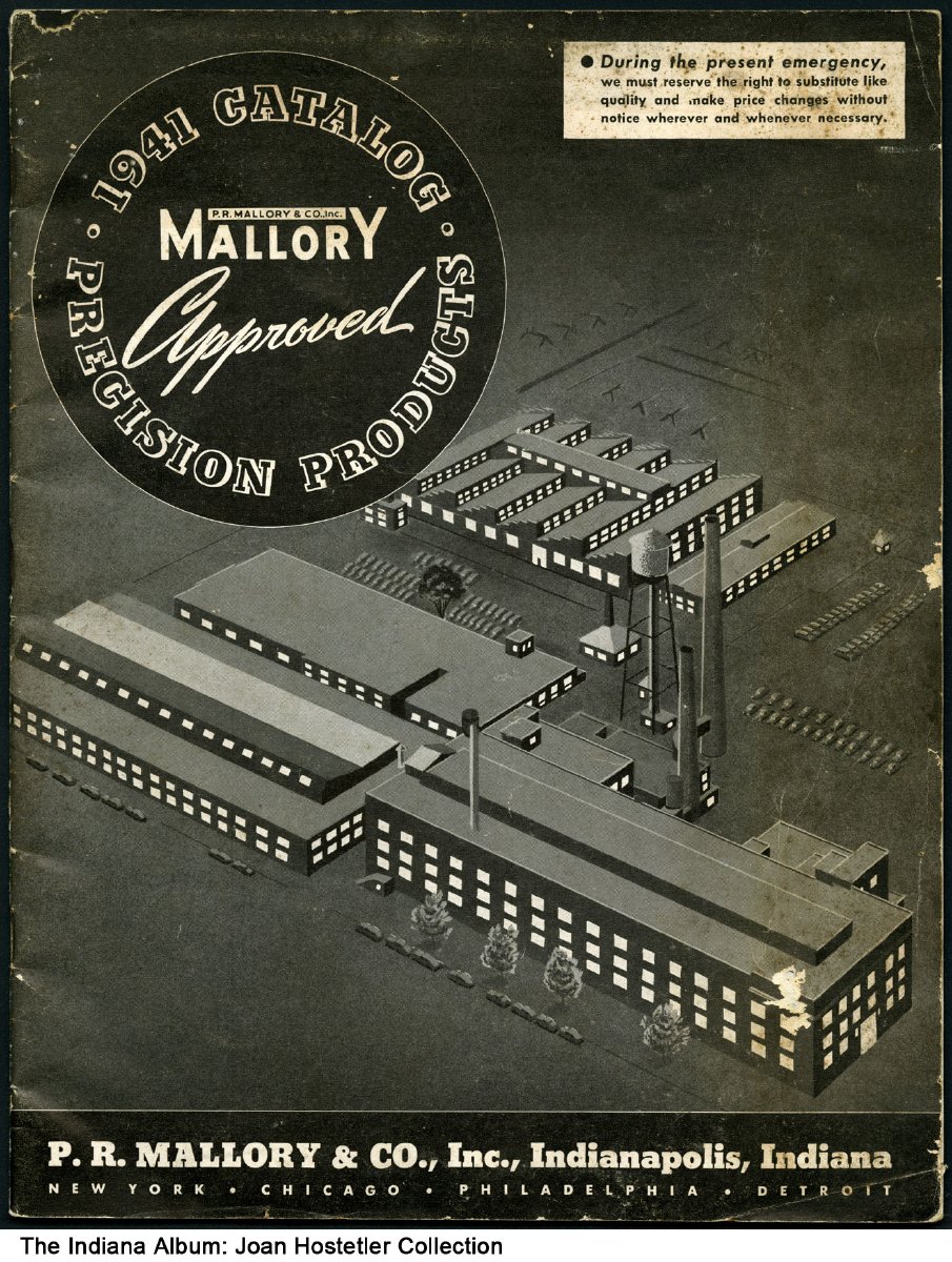 The cover features an illustration of the P R Mallory buildings. 