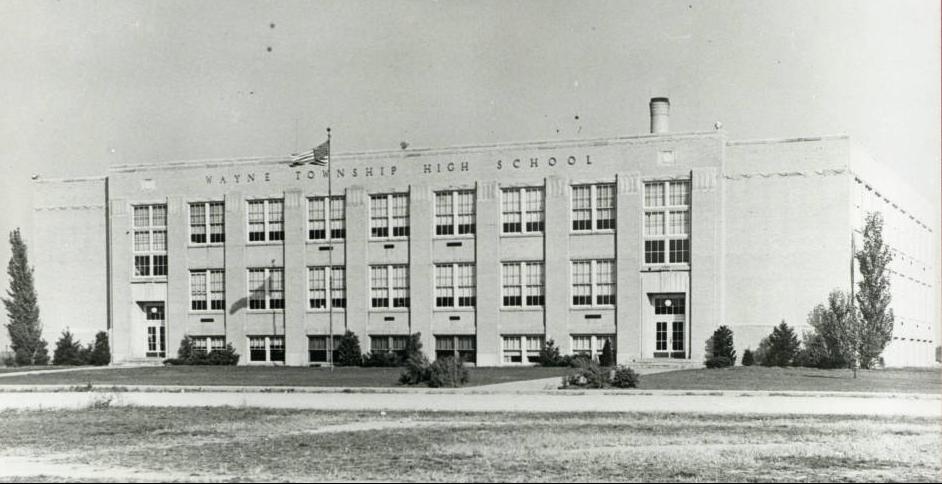 A multi-story high school building. 