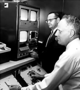Seymour Friedberg, director of the Educational Resources Program at the Med. Center, adjusts the wave form monitor while Ralph Nye, electronics technician, makes a video recording. The wave form monitor shows the shape and strength of the video signal being recorded or sent out over the air