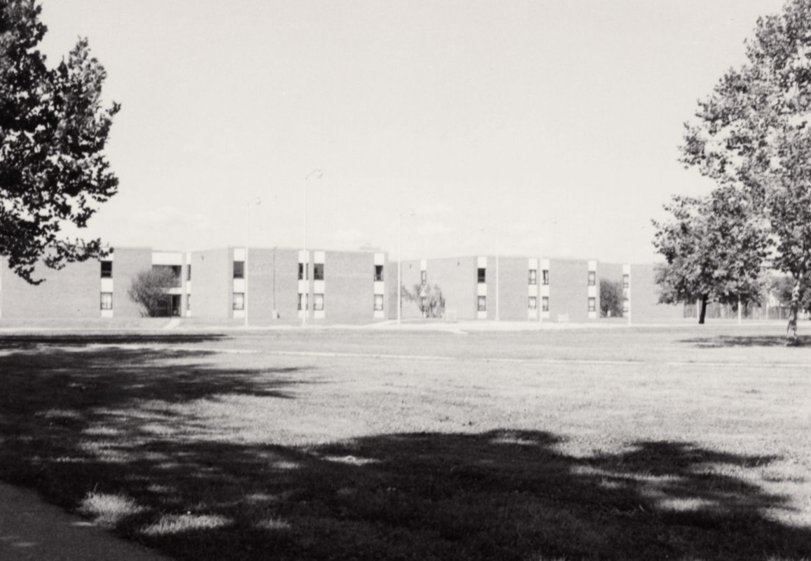 A modern multi-story dormitory building.