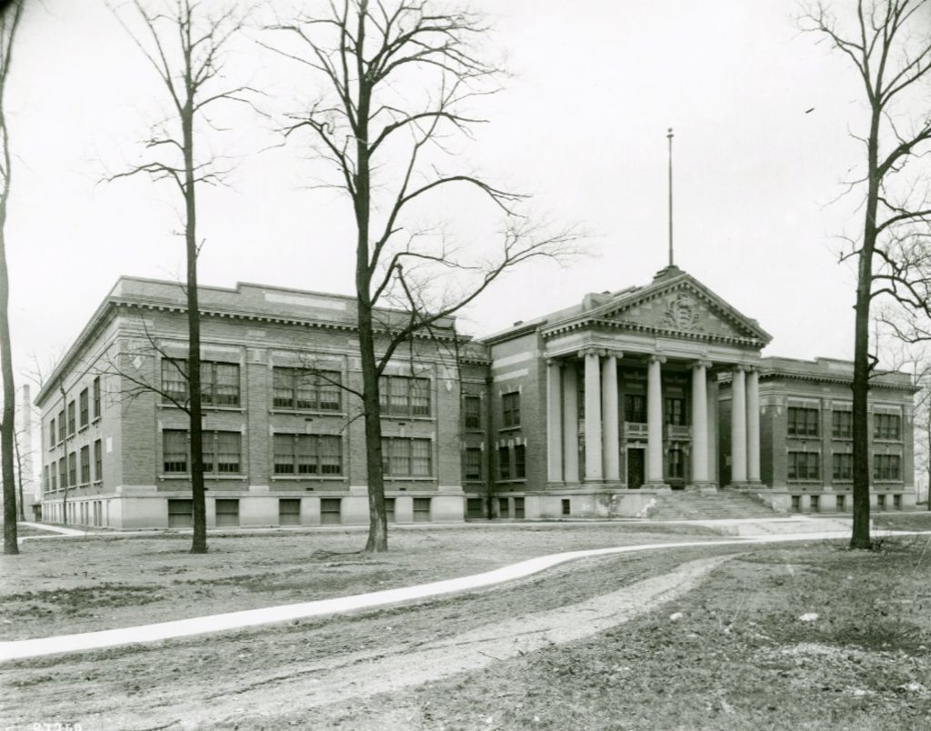 A multi-story building with large columns lining the front entrance.