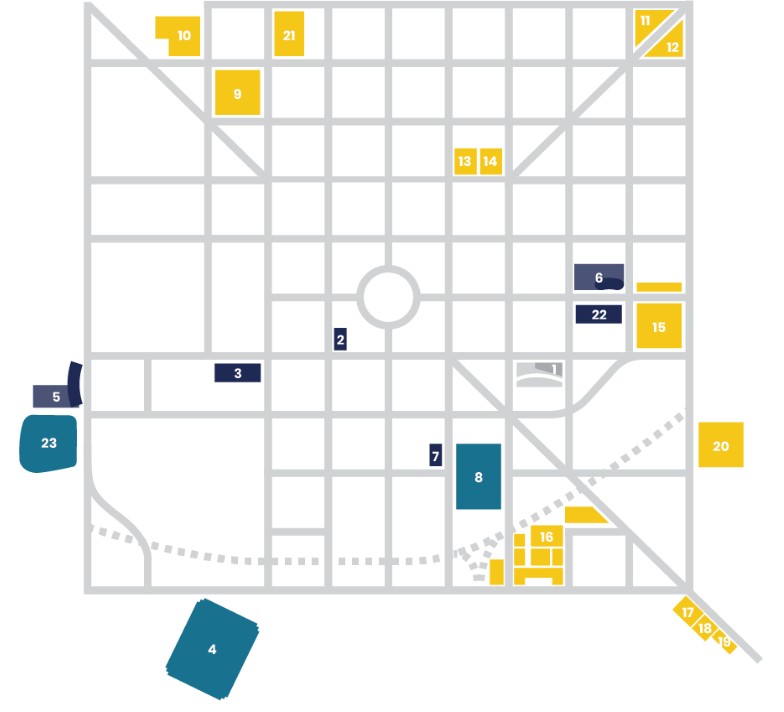 Simplified map of downtown Indianapolis showing numbered development project sites highlighted in yellow, blue, and teal. The projects are distributed across the Mile Square street grid, with numbered labels marking locations throughout the downtown area.